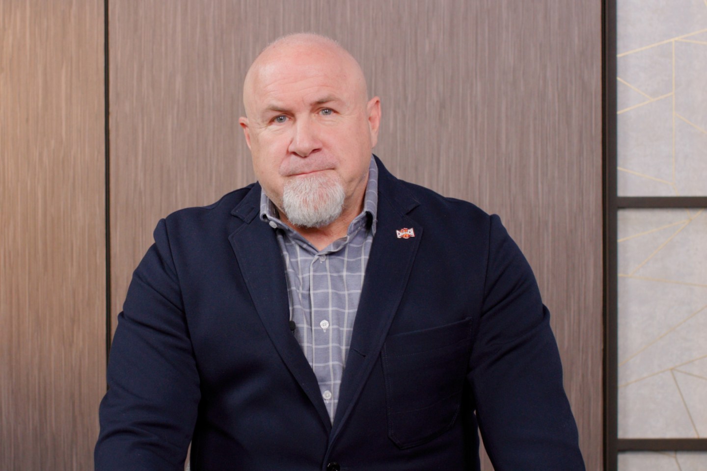 Portrait of Crunch Fitness CEO Jim Rowley seated at Fortune's video studio.