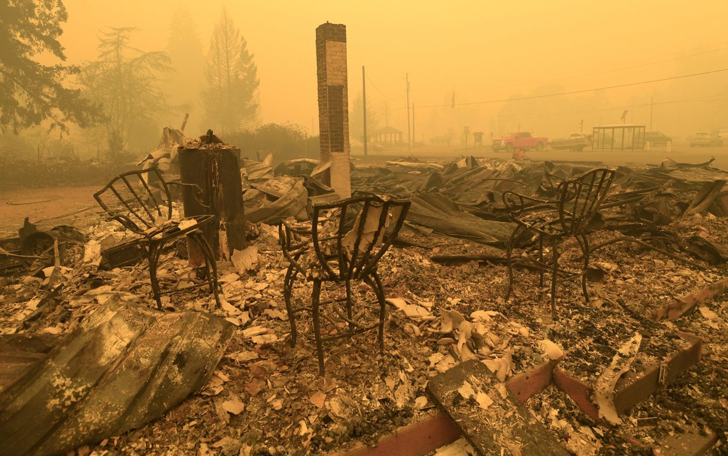Chairs stand at the Gates Post office in the aftermath of a fire in Gates, Ore., Sept 9, 2020.