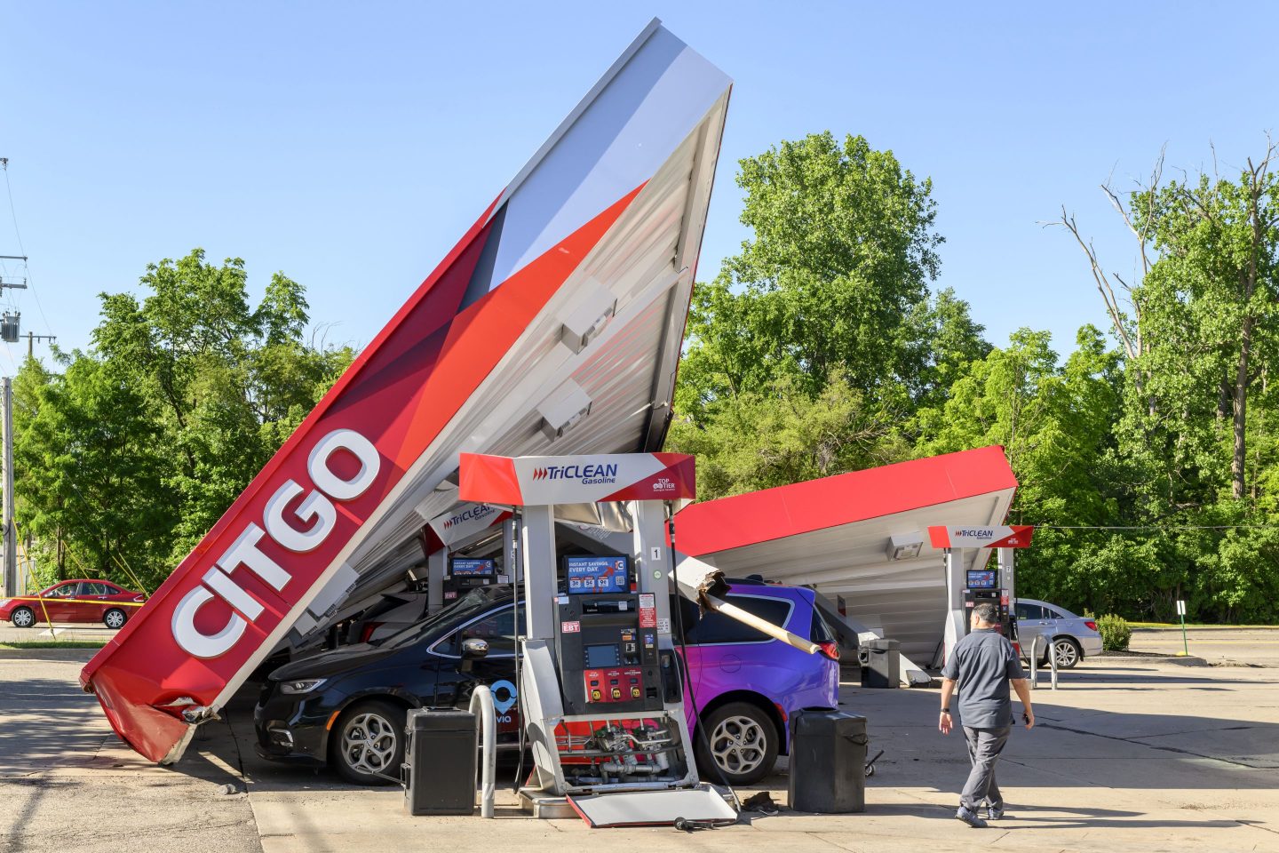 Powerful storms the night before left a gas station heavily damaged on West Ten Mile Road, in Farmington Hills, Mich., on June 6, 2024.