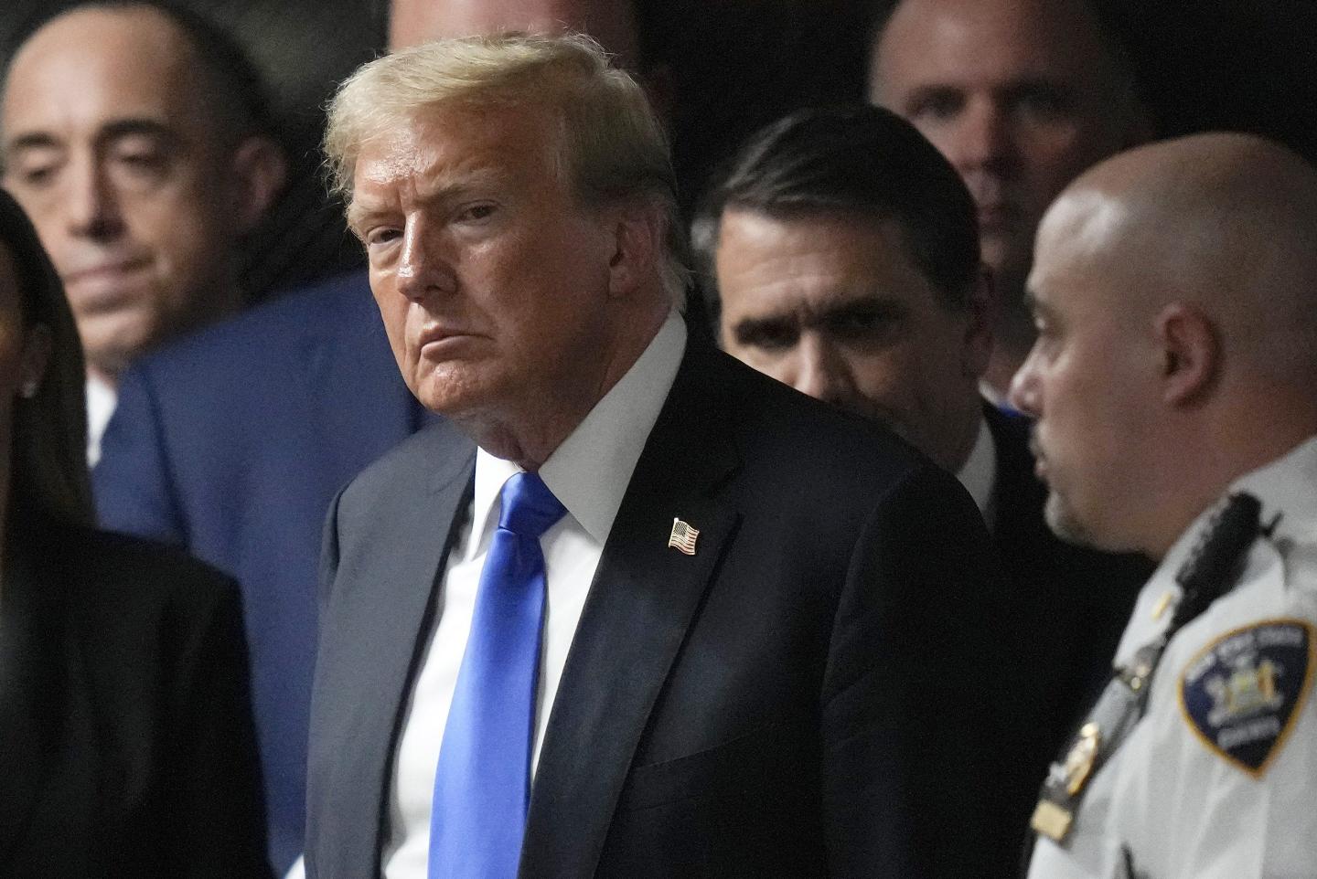 Donald Trump walks out of the courtroom