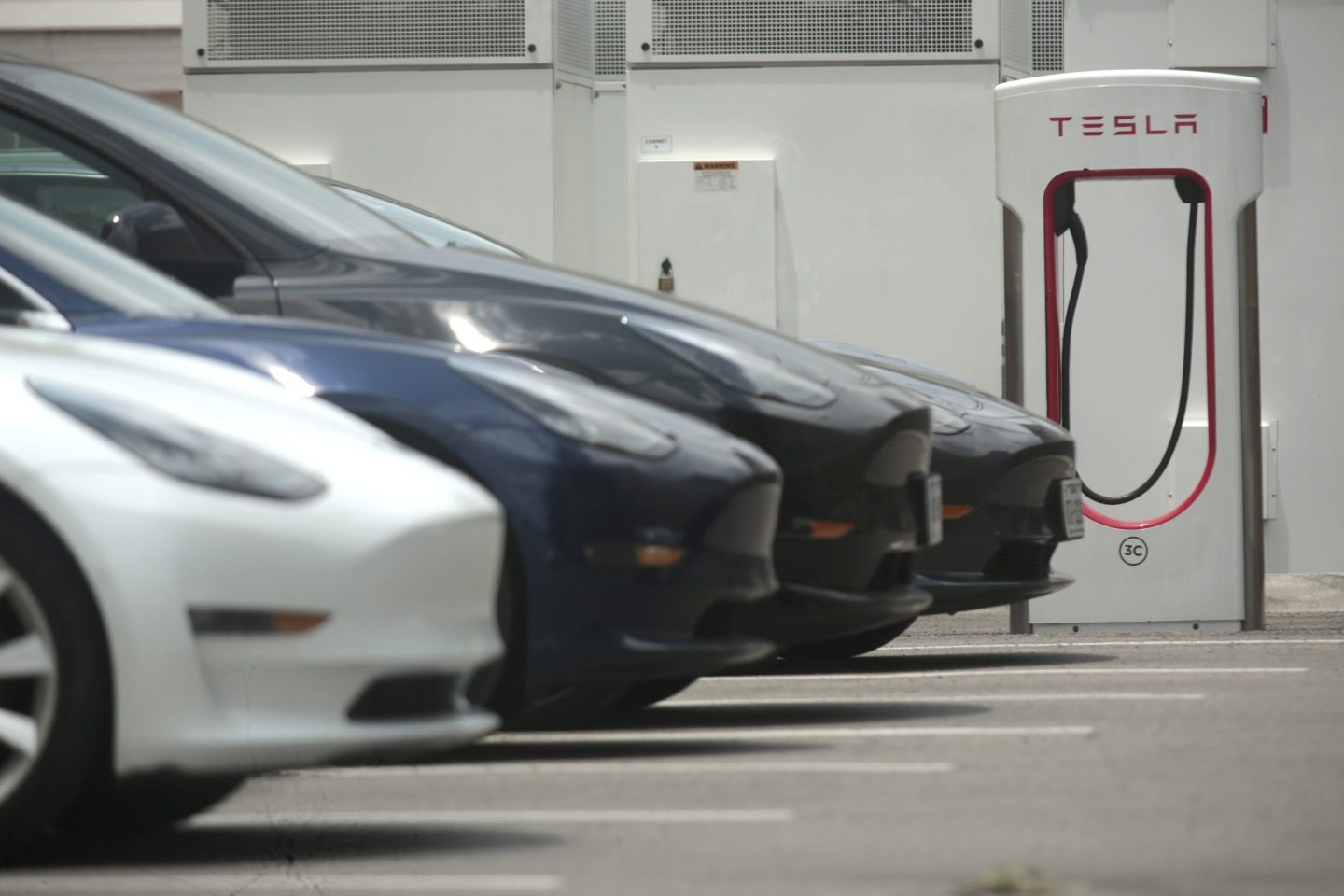 A Tesla supercharging location is seen on Kipling Street, June 3, 2024 in Houston.