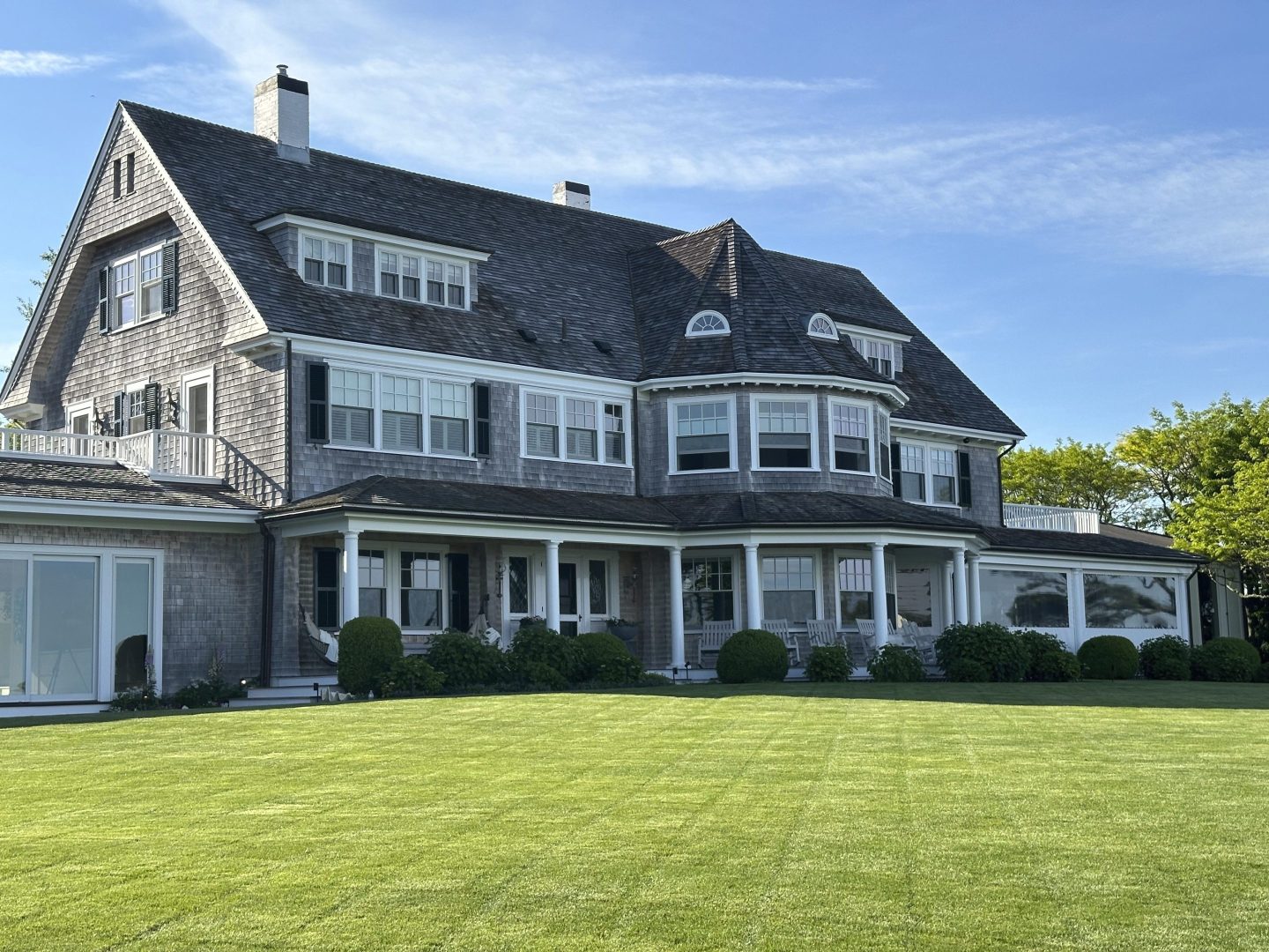 A home sits on a freshly mowed lawn in Edgartown, Mass., Tuesday, June 4, 2024.