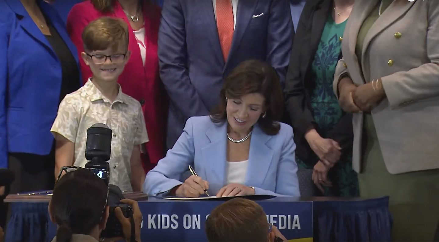NY Gov. Kathy Hochul signed a bill that would allow parents to block their children from getting social media posts suggested by a platform's algorithm, a move to limit feeds critics argue are addictive.