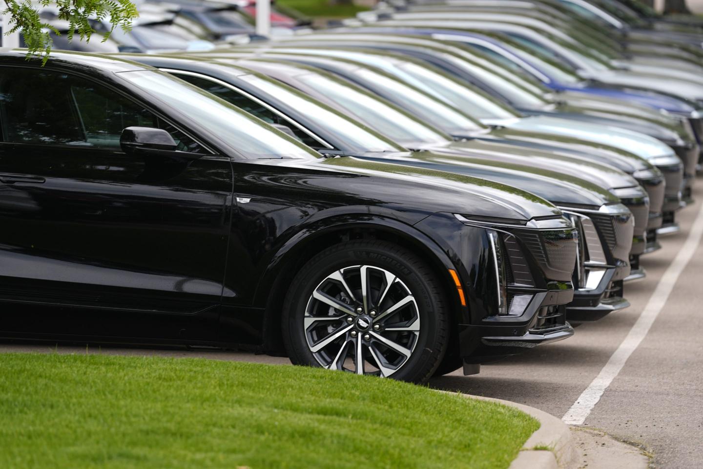 cars lined up at a dealership