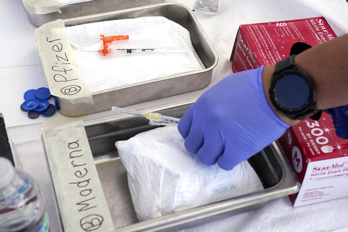 As COVID-19 cases tick up, U.S. health officials recommend new shots for all Americans this fall