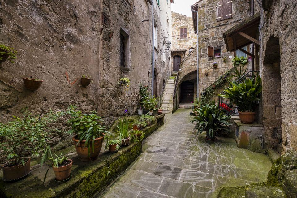 Stone houses and a small alley of the medieval town
