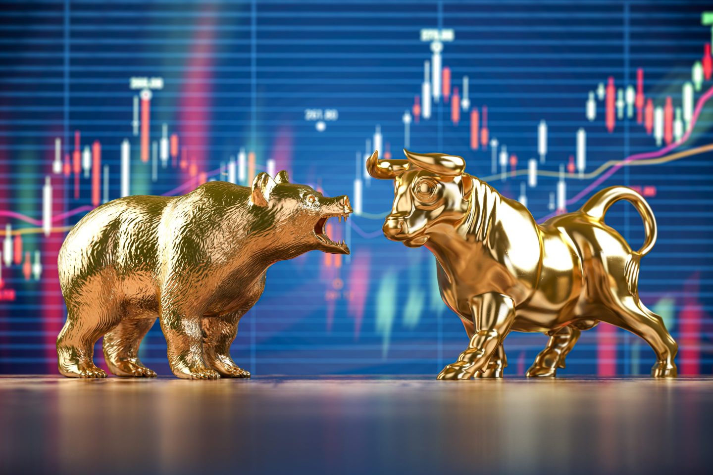 Golden bull and bear on stock chart