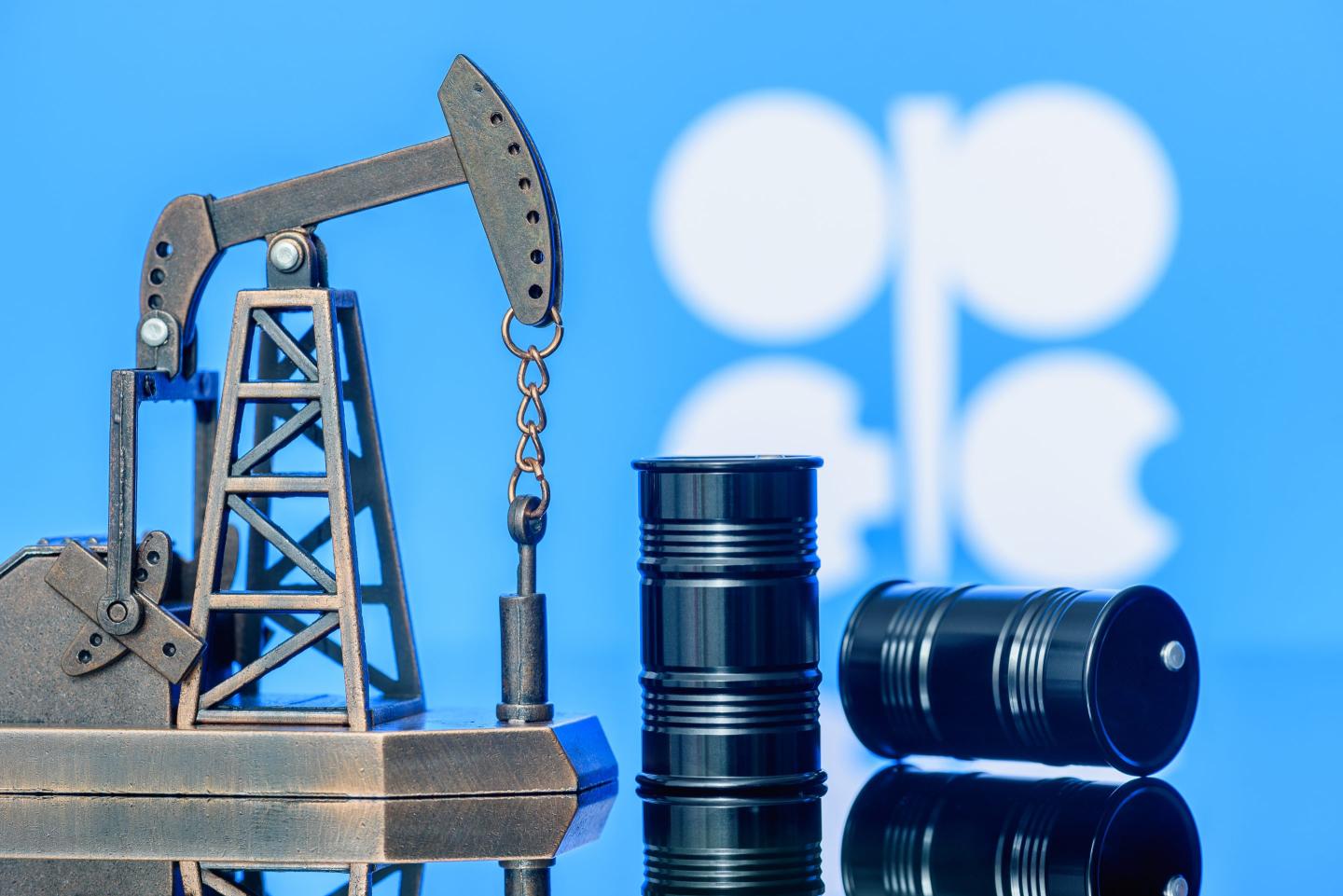 pump jack and oil barrels