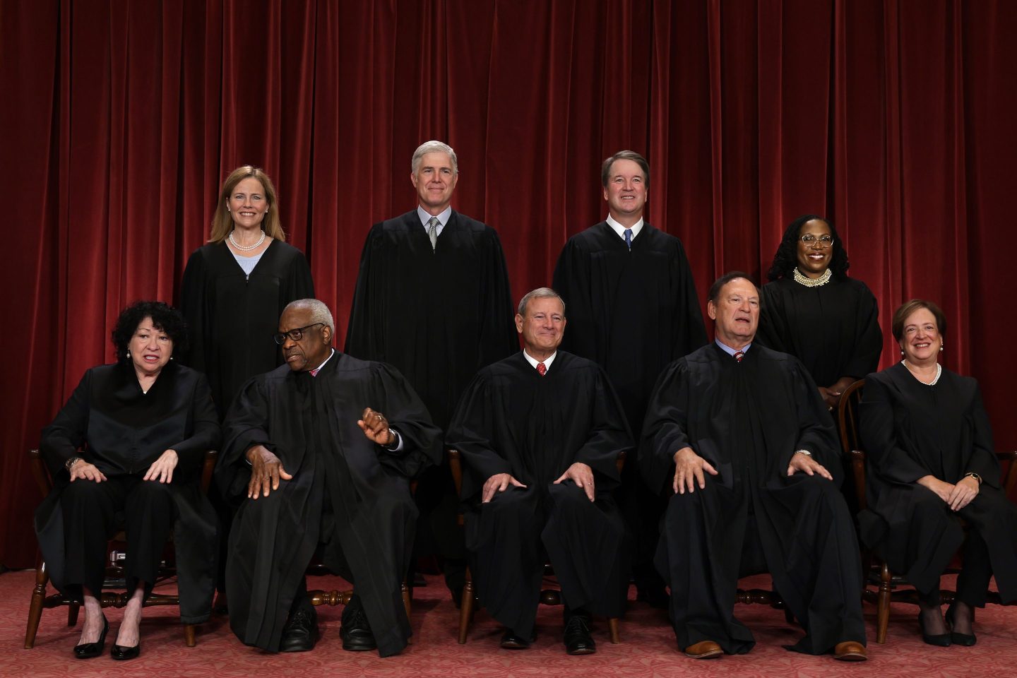United States Supreme Court (front row L-R) Associate Justice Sonia Sotomayor, Associate Justice Clarence Thomas, Chief Justice of the United States John Roberts, Associate Justice Samuel Alito, and Associate Justice Elena Kagan, (back row L-R) Associate Justice Amy Coney Barrett, Associate Justice Neil Gorsuch, Associate Justice Brett Kavanaugh and Associate Justice Ketanji Brown Jackson pose for their official portrait at the East Conference Room of the Supreme Court building on October 7, 2022 in Washington, DC.