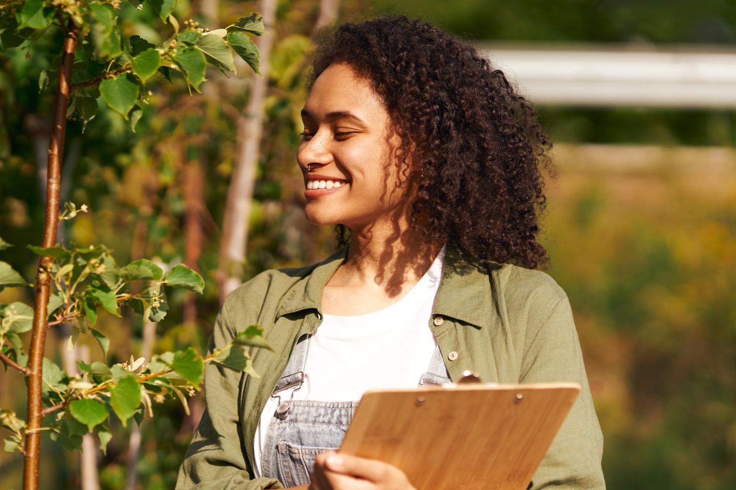 Smiling female gardener