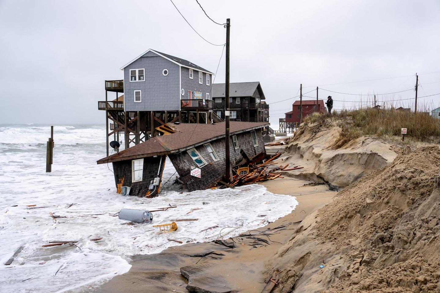 A North Carolina beach house collapses into the ocean.
