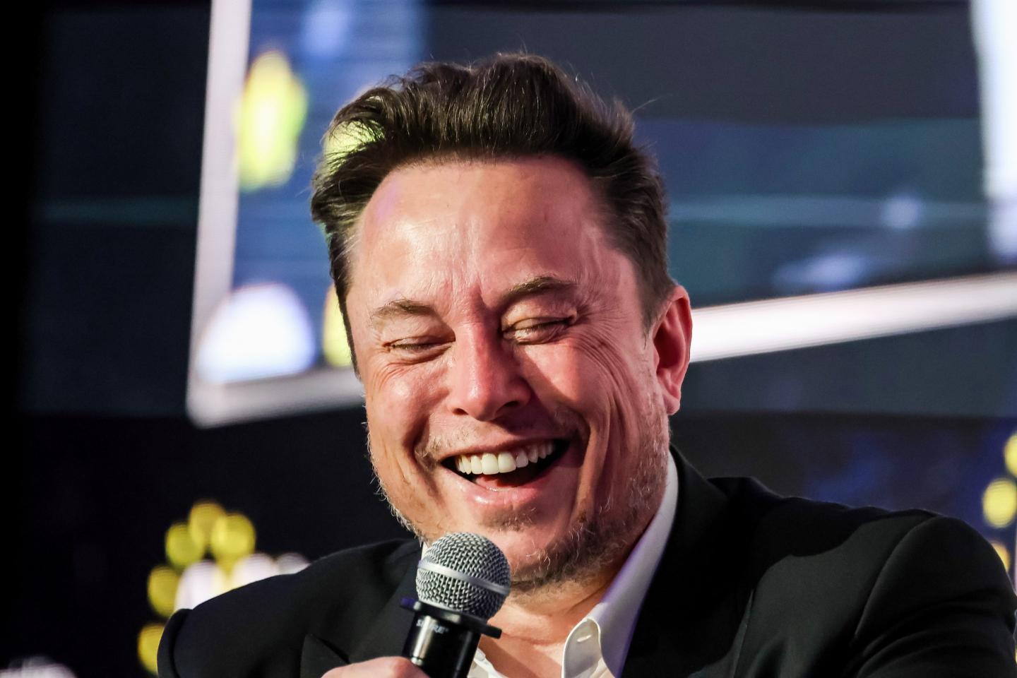 Elon Musk laughing