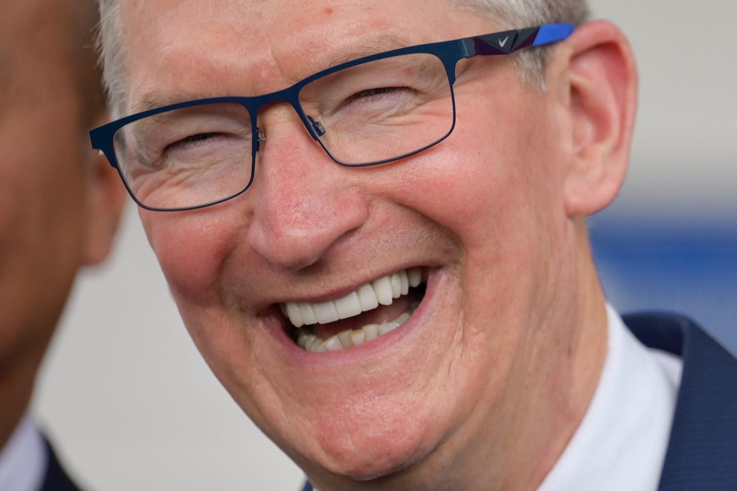Apple CEO Tim Cook smiling