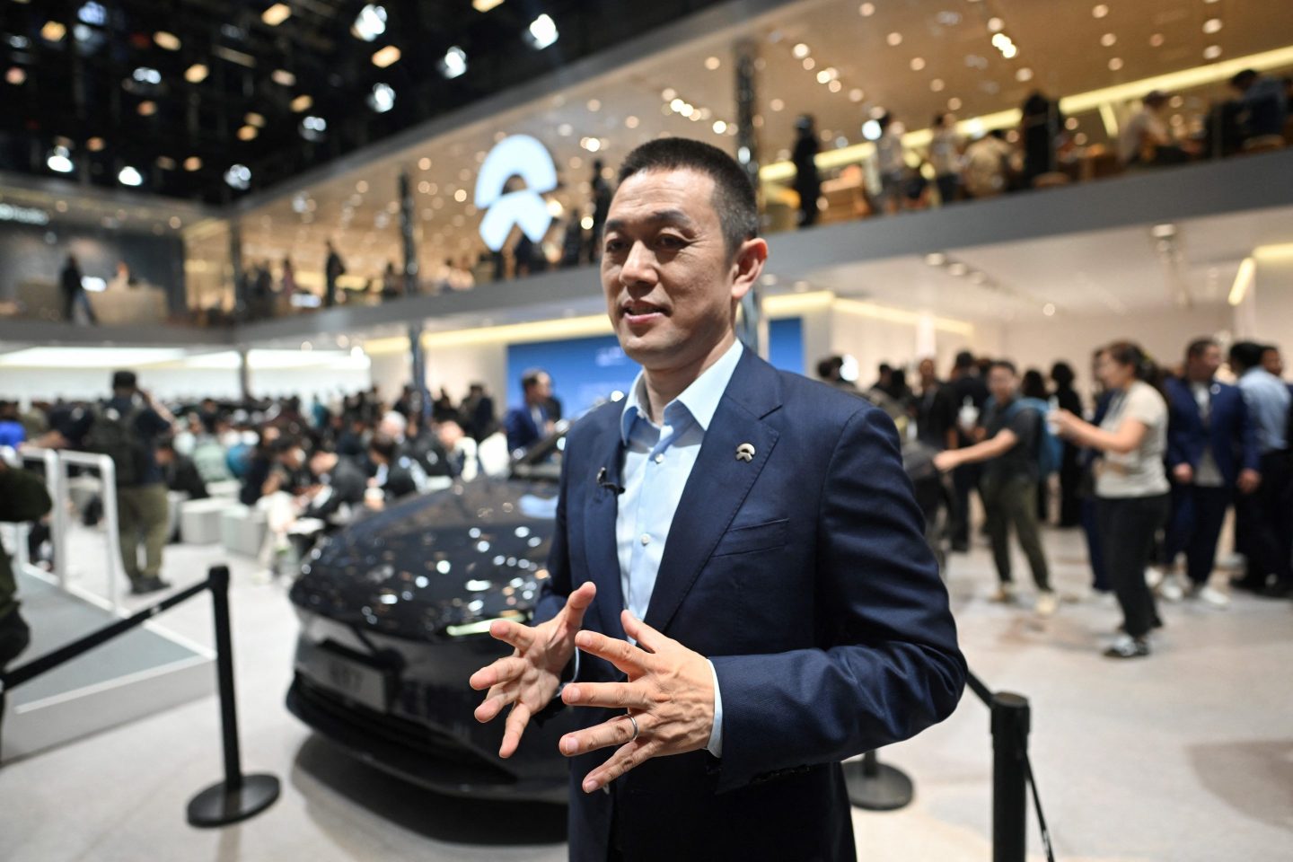 William Li, CEO of Nio, a Chinese EV startup, at the Beijing Auto Show on April 25, 2024. Li said on an earnings call that EU tariffs on Chinese-made EVs go against the “initiative of sustainable development.”
