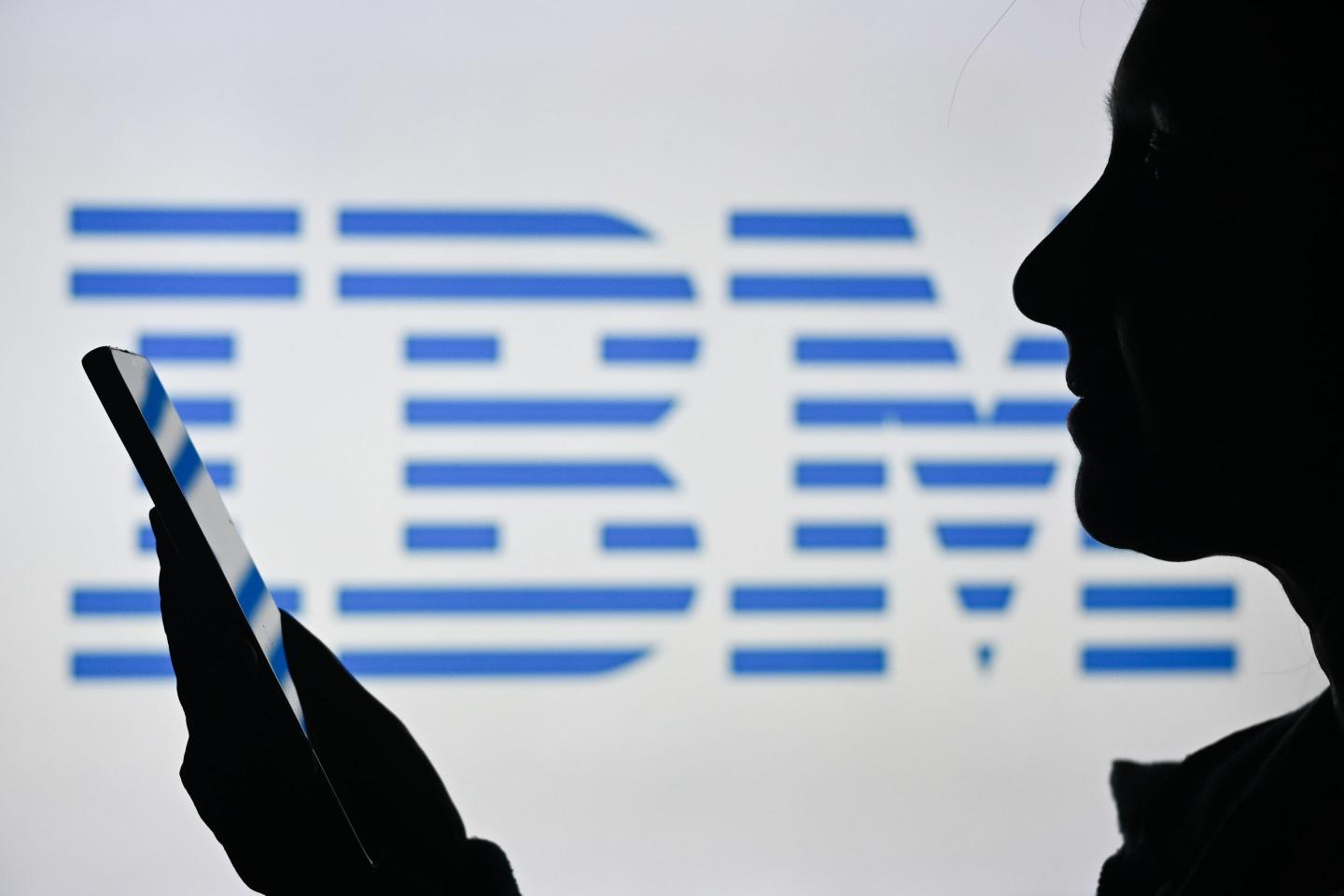 IBM worker uses phone.
