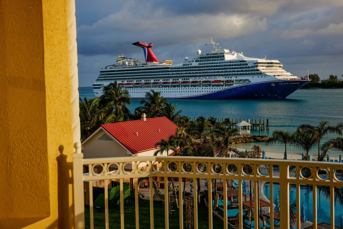 The Carnival Sunshine cruise ship travels toward the port in Nassau, Bahamas.