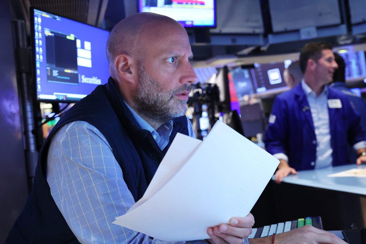 Traders work on the floor of the New York Stock Exchange during morning trading on June 12, 2024 in New York City.