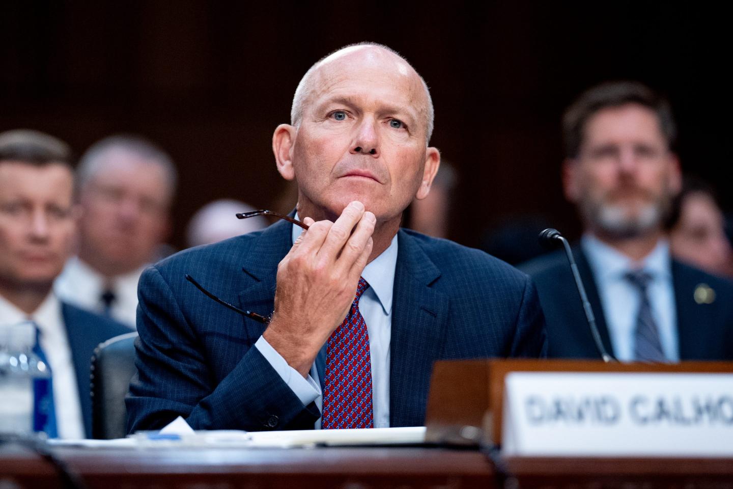 Boeing CEO Dave Calhoun rubs chins