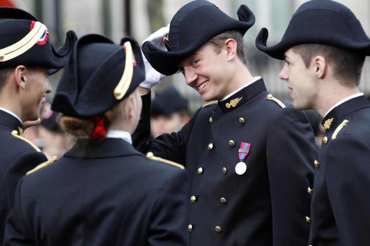 Frederic Arnault (C), son of French luxury group LVMH Chairman and CEO Bernard Arnault, and student of the Ecole Polytechnique (Special military school of Polytechnique), attends the preparation of the annual Bastille Day military parade on July 14, 2015 in Paris, France.