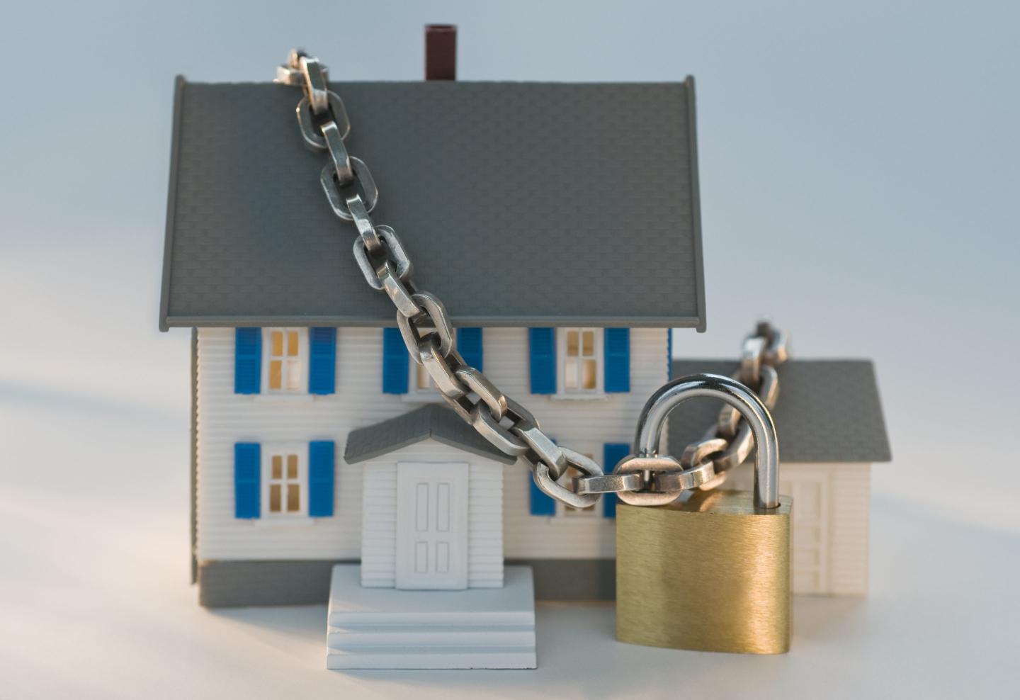 Model house locked with chain