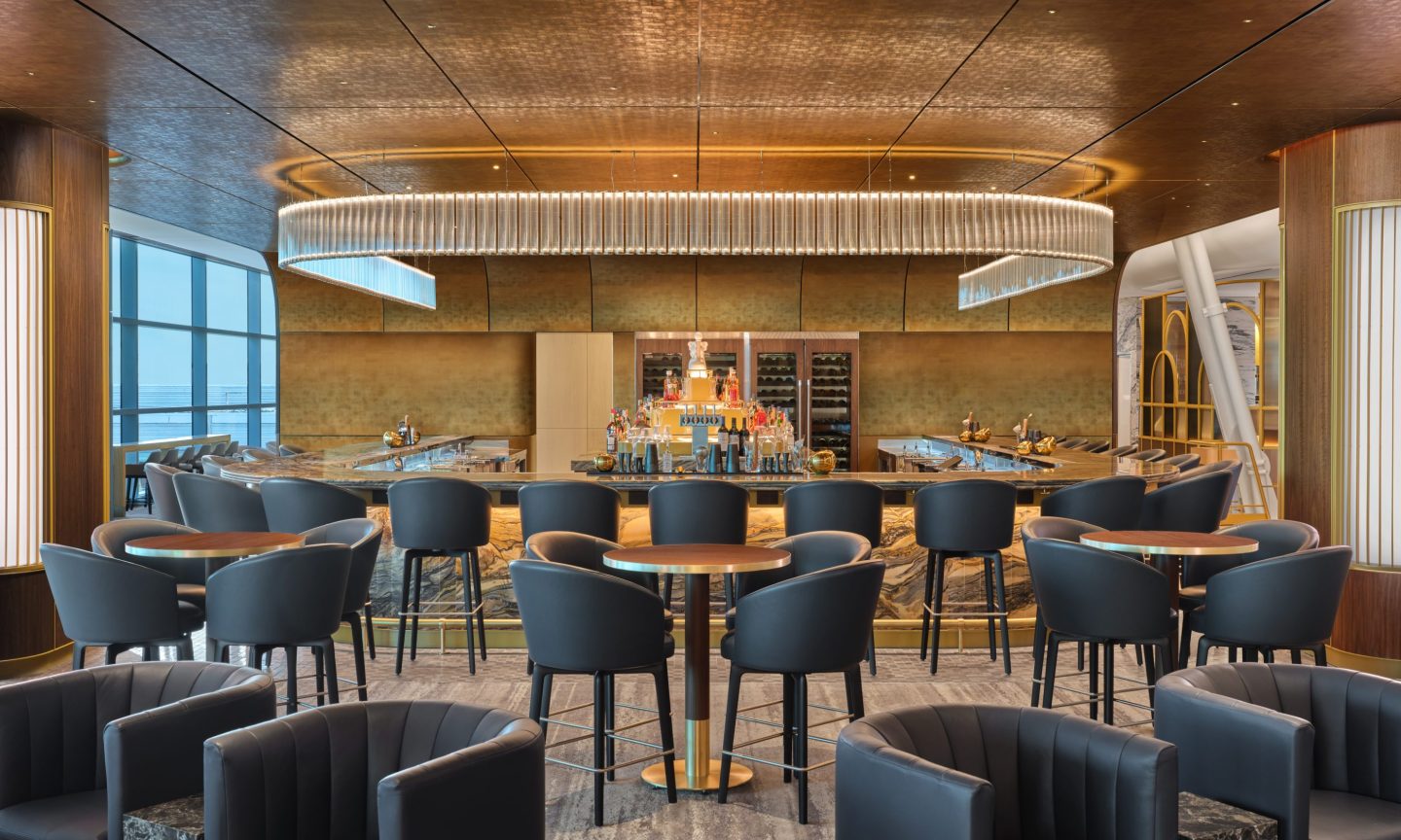 The bar at the Delta's newest, biggest lounge serves elevated takes on classic cocktails, and features Art Deco-inspired lighting, a nod to the gold leaf ceiling and chandeliers of Radio City Music Hall.