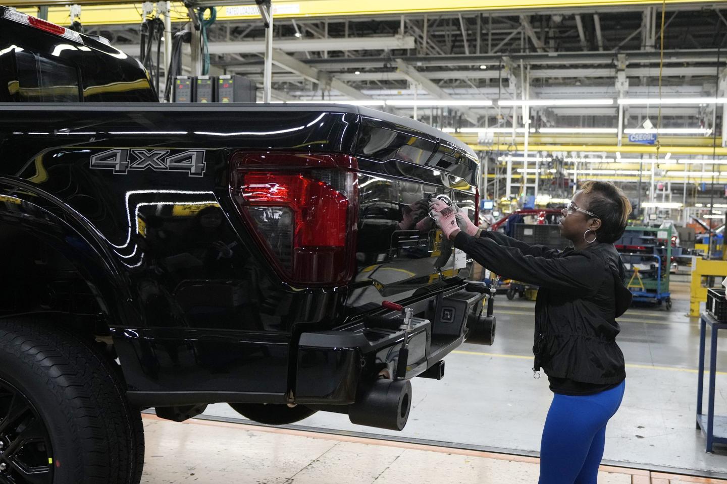 worker works on truck