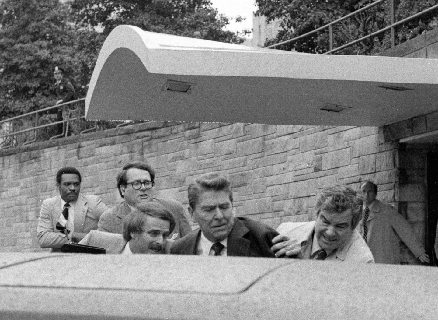 Ronald Reagan shoved into limo