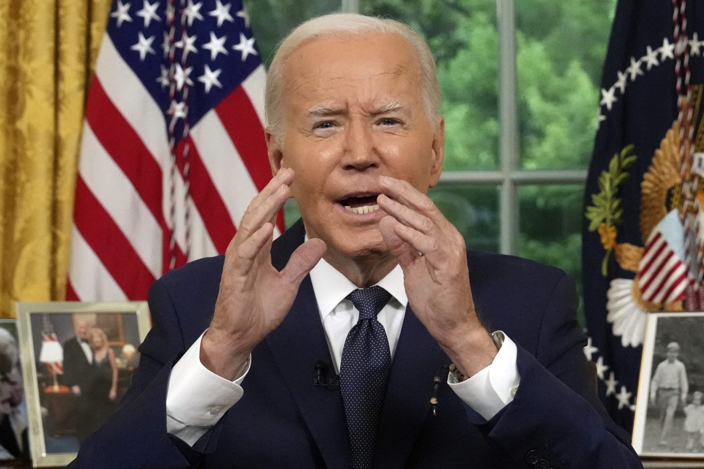 Joe Biden holds up hands