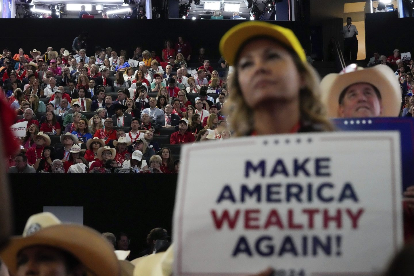 Delegates watch during the Republican National Convention on July 15, 2024, in Milwaukee.