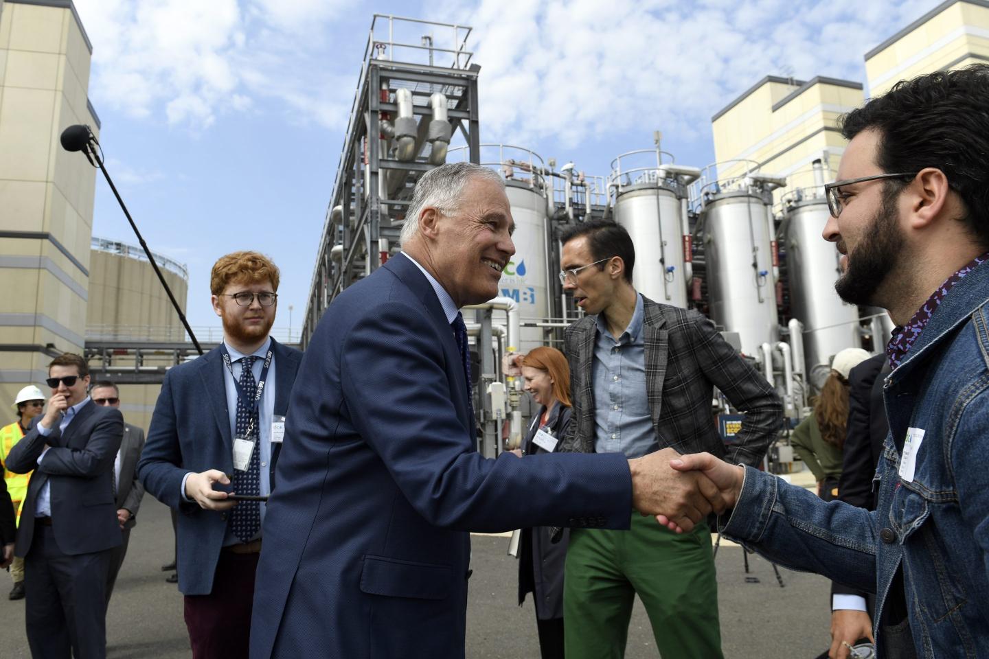 Hedge funder leads drive to overturn Washington carbon pricing law that has raised over $2bn but has seen gas prices rise to 3rd highest in U.S.