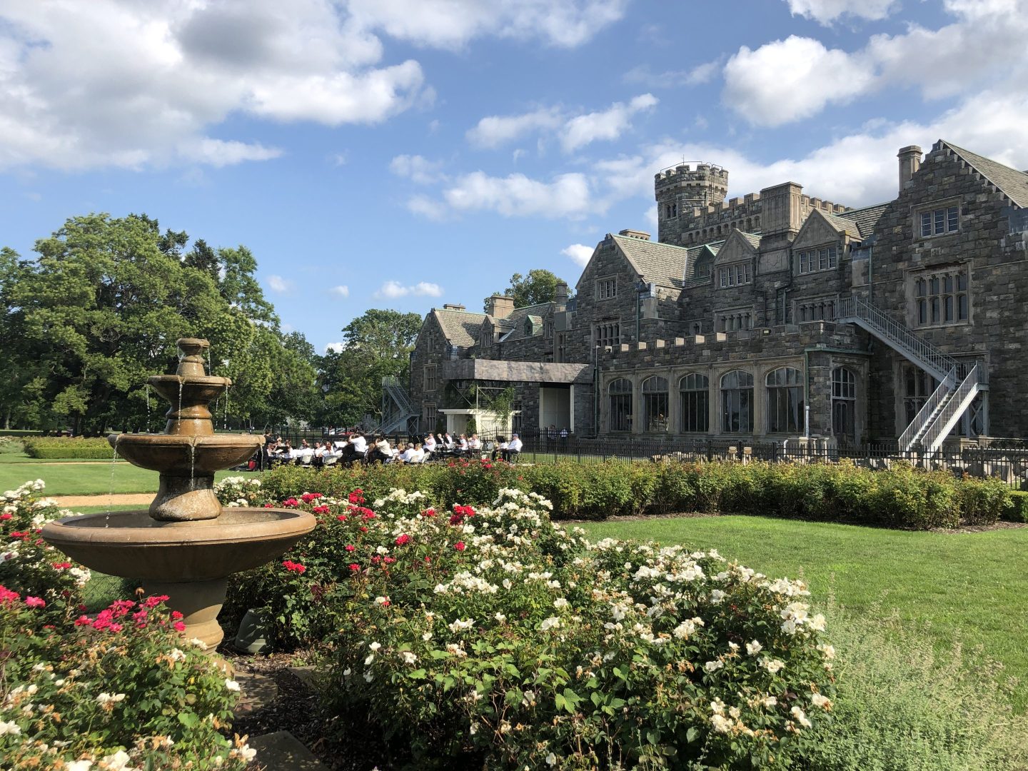 The symphony orchestra performs in front of Hempstead House at Sands Point Preserve in Sands Point, N.Y.