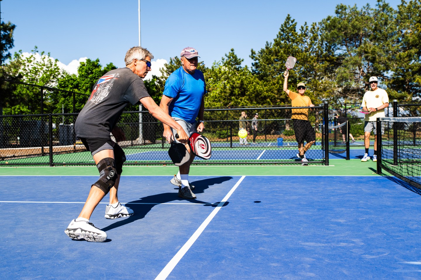 Older adults play pickleball, one of the fastest-growing sports, and build community.