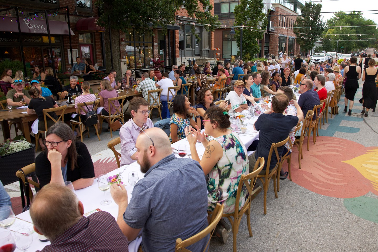 Community members gather for the annual Farm to Street Dinner on the Northside of Iowa City.