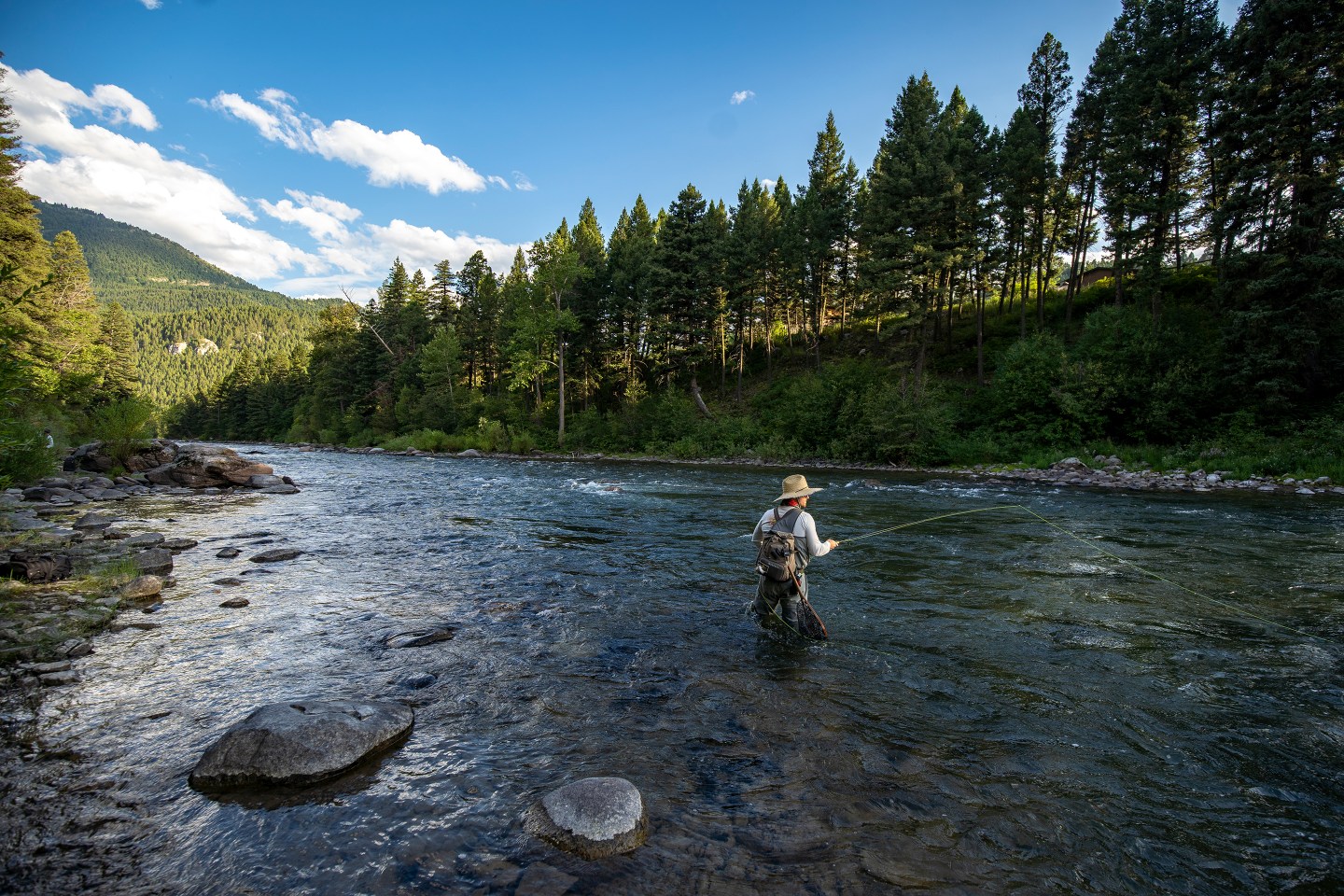 Bozeman offers many outdoor activities like fly fishing, like seen here, hiking, skiing, and more.