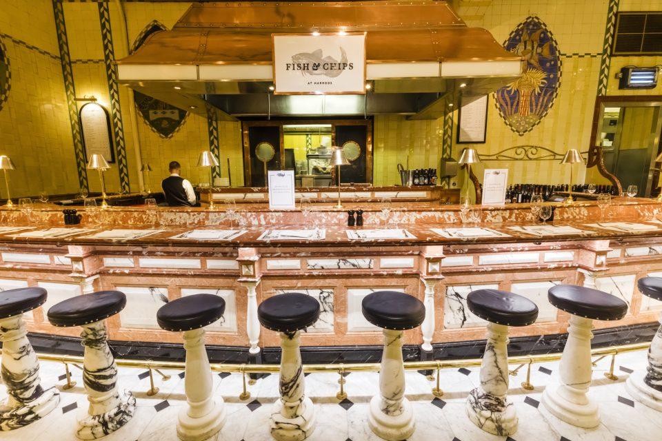 England, London, Knightsbridge, Harrods, Food Hall, Fish & Chips Restaurant Counter (Photo by: Dukas/<a href="https://fortune.com/company/universal/" target="_blank">Universal</a> Images Group via Getty Images)