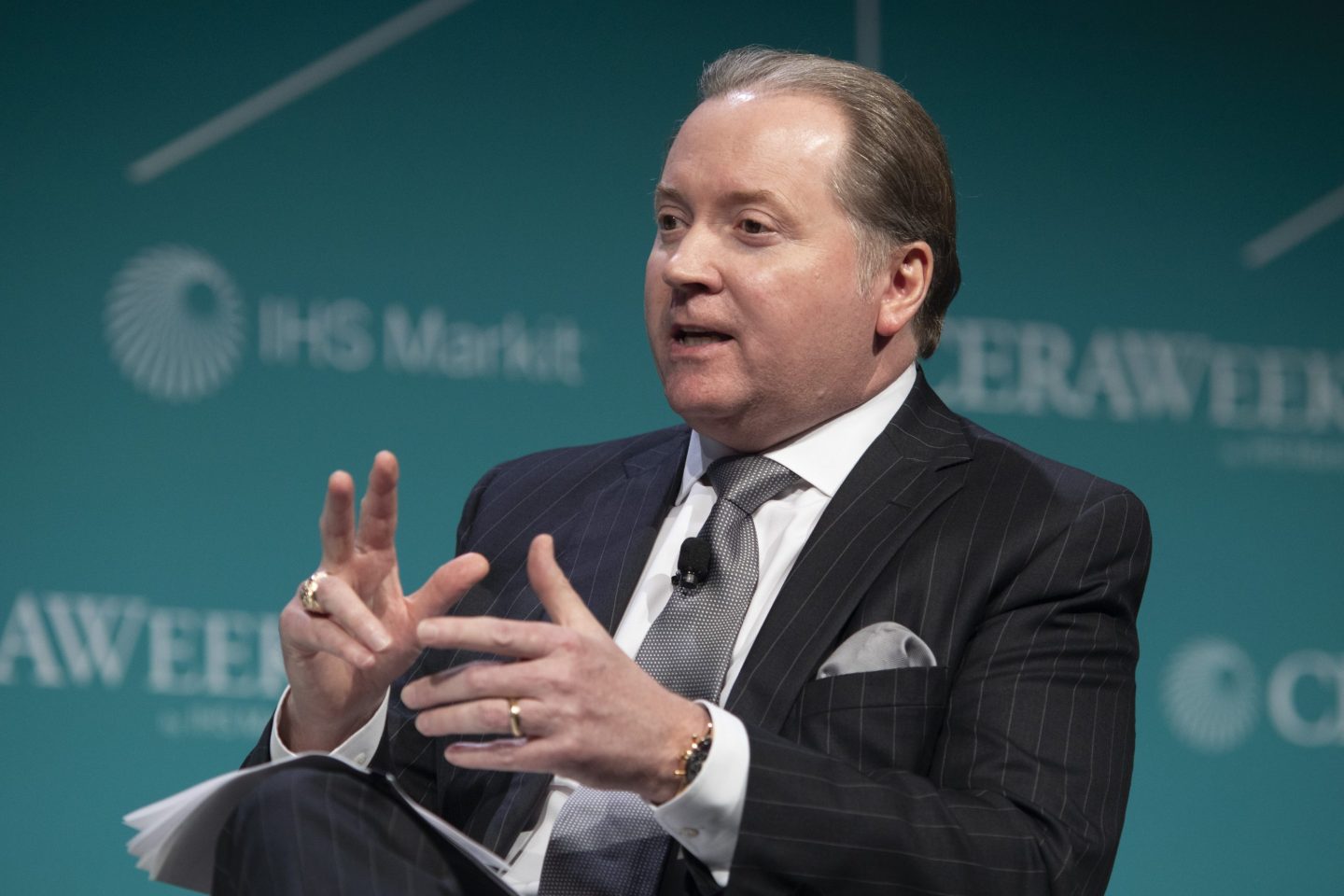 Marathon Oil Lee Tillman holding his hands in a weird way