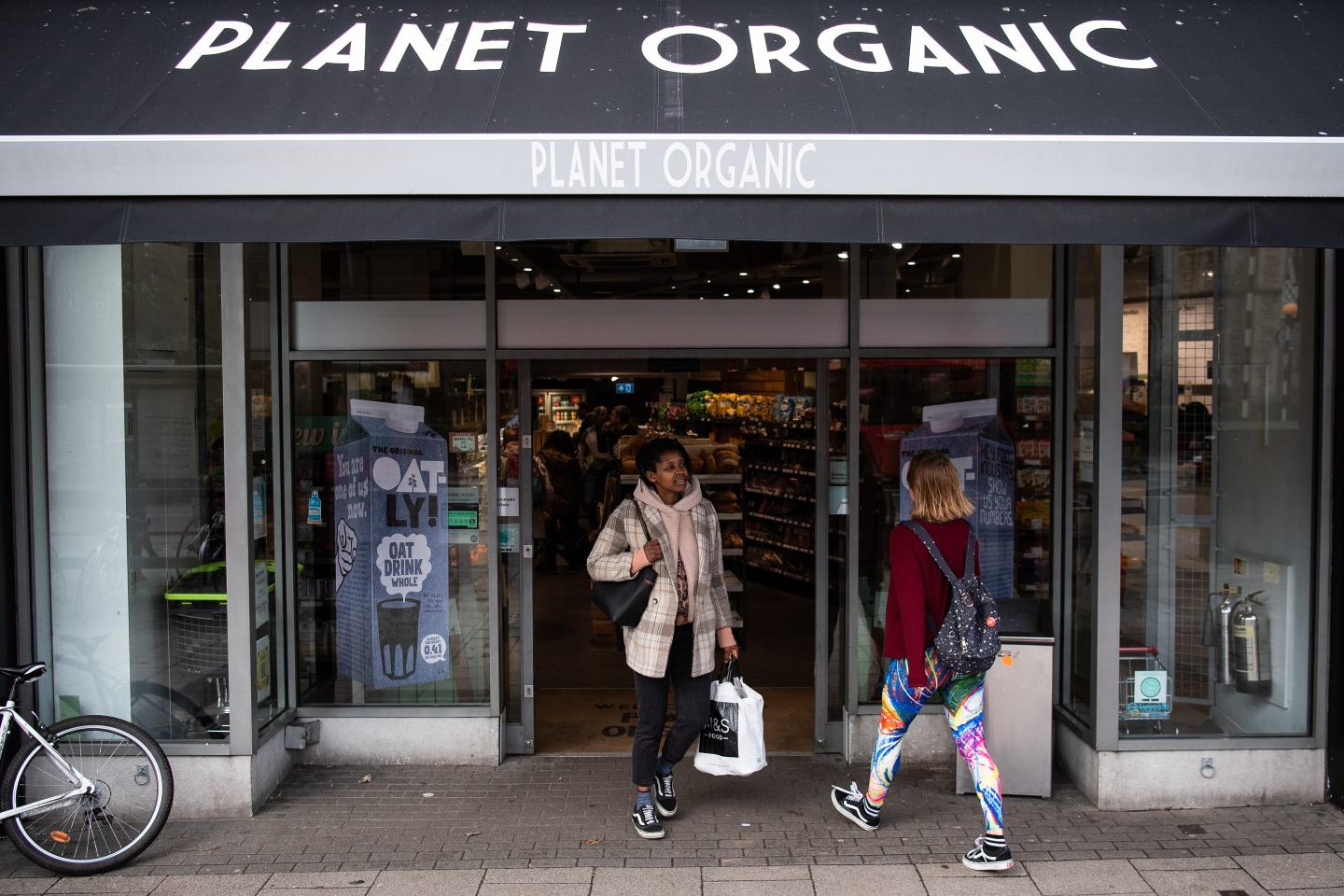Customers come and go from a branch of the Planet Organic healthfood store on January 03, 2020 in London, England.