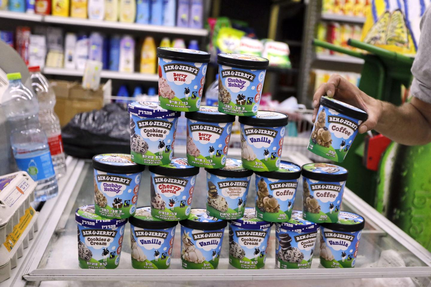 A man buys Ben &amp; Jerry's ice cream in Jerusalem on July 20, 2021.
