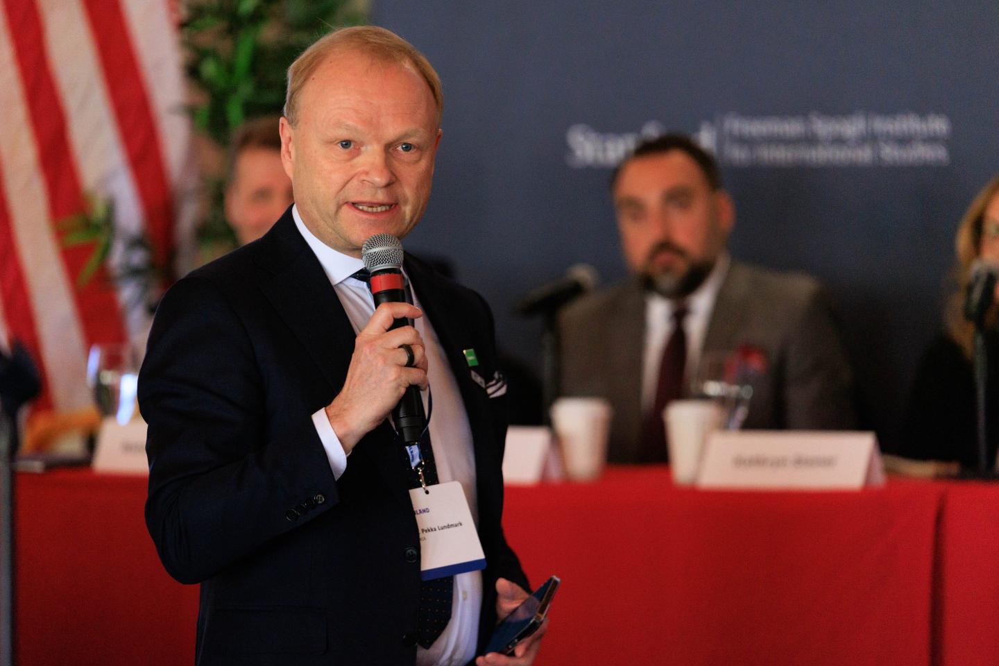 Nokia President and CEO Pekka Lundmark addresses Finland's President Sauli Niinisto at Stanford University in Palo Alto, Calif., on March 7, 2023.