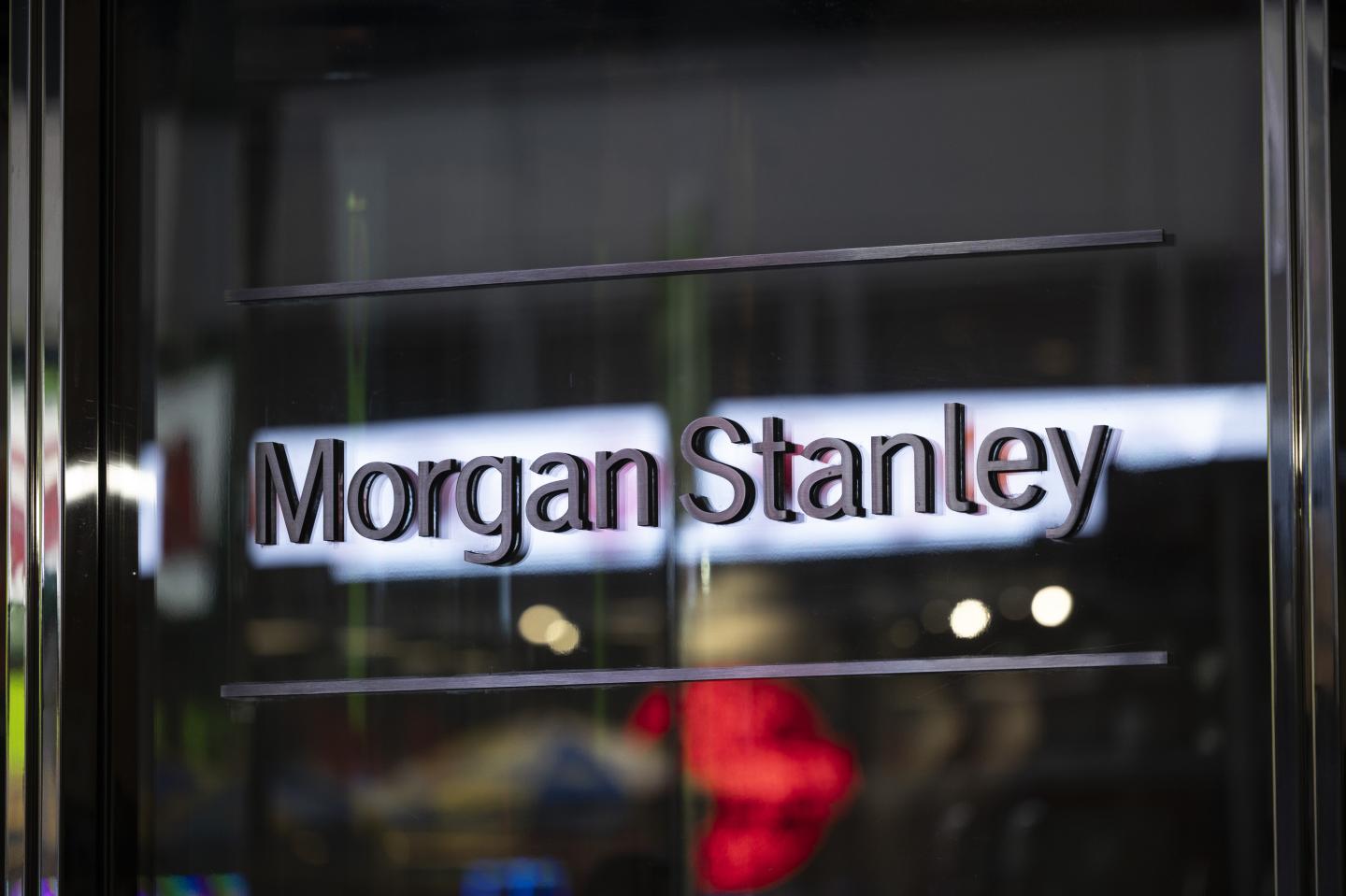 The Morgan Stanley logo and a black and silver reflective surface