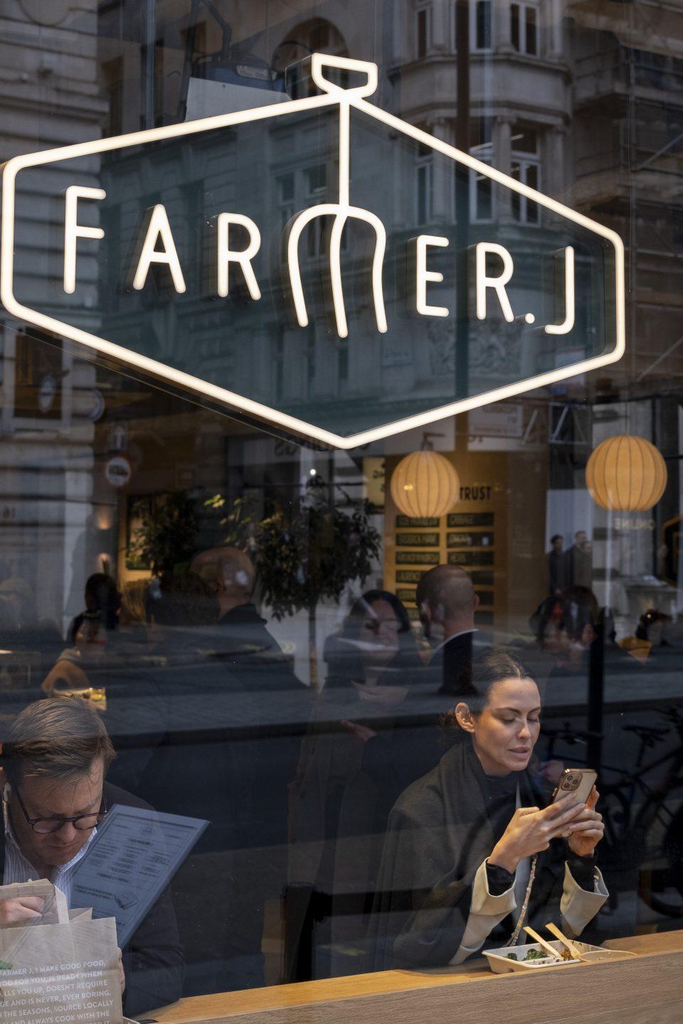 People having lunch in a restaurant, seen through a window