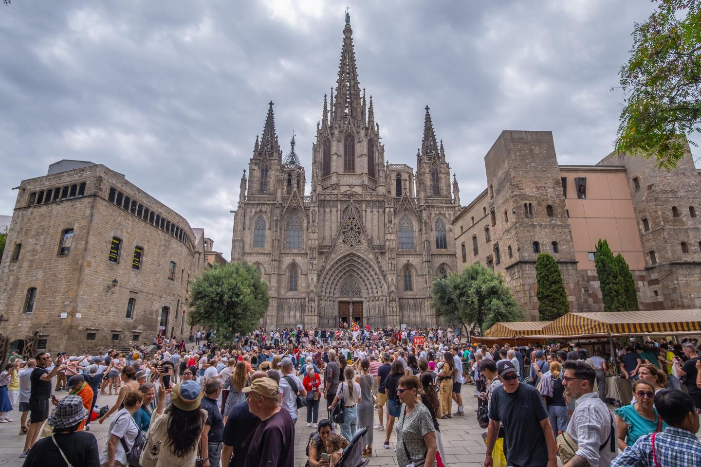 hundreds of people seen outside of Barcelona Cathedral
