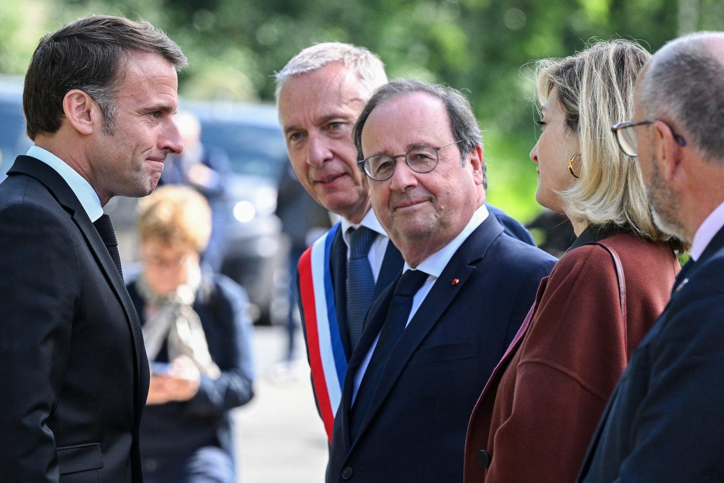 France's President Emmanuel Macron meets France's former President Francois Hollande.