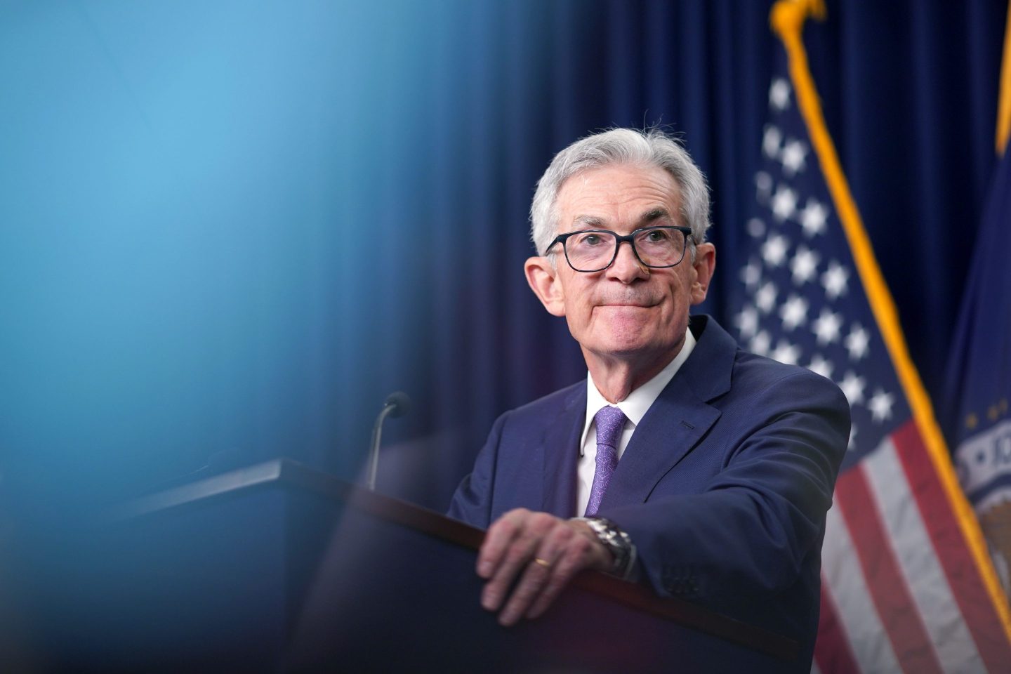 Jerome Powell, chairman of the US Federal Reserve, smiles to the crowd during a news conference.