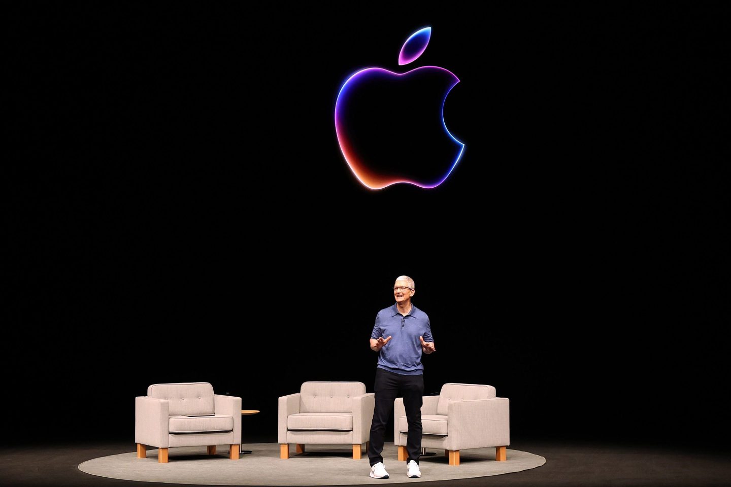 Apple CEO Tim Cook delivers remarks at the start of the Apple Worldwide Developers Conference (WWDC) on June 10, 2024, in Cupertino, Calif.