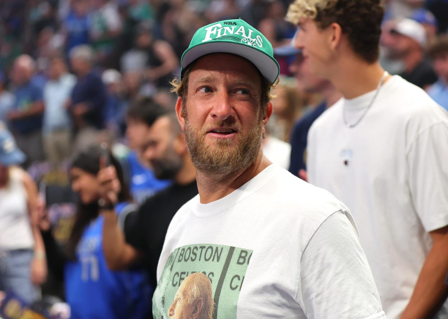 Dave Portnoy stands on the sidelines at the NBA Finals