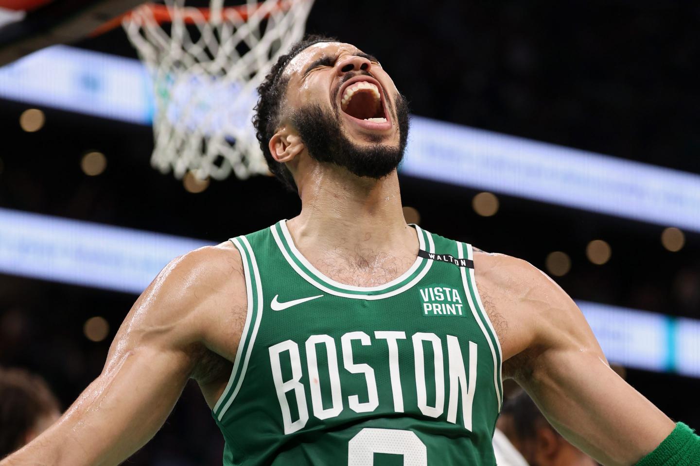 Jayson Tatum yells in celebration