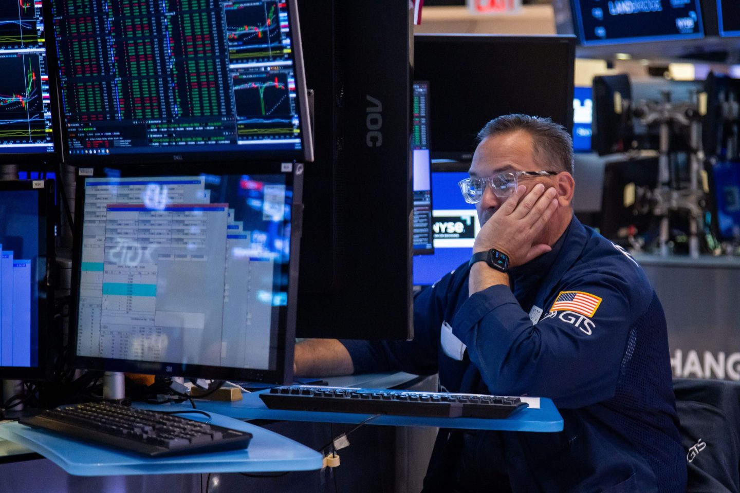 A trader works on the floor of the New York Stock Exchange (NYSE) in New York, US, on Friday, June 28, 2024.