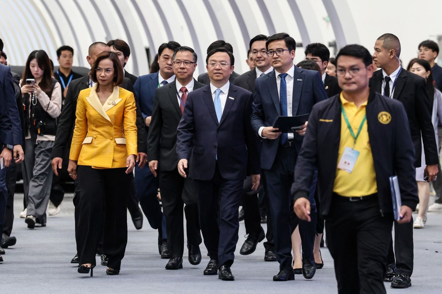 Wang Chuanfu, chairman and chief executive officer at BYD Co., center, arrives at the launch of the company's new plant in Nikhom Phatthana, Rayong province, Thailand, on July 4, 2024.