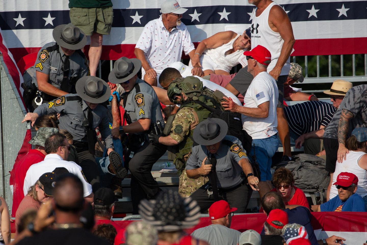 Former fire chief who died at Trump rally used his body to shield family from gunfire